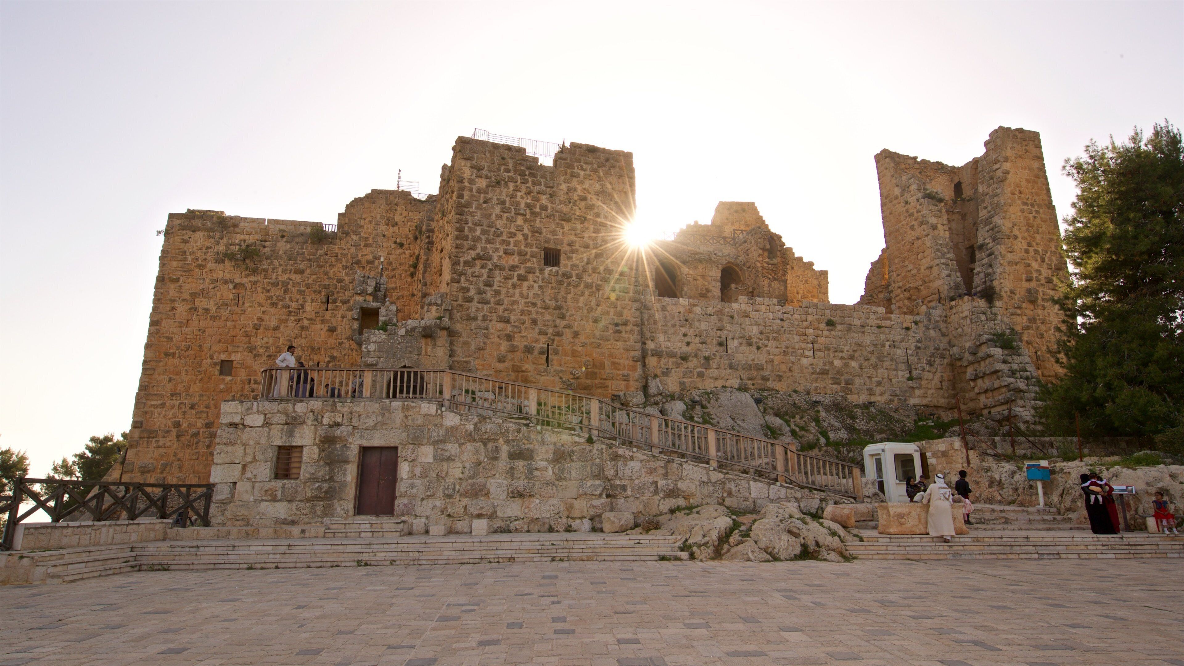 Ajloun Castle showing heritage architecture and a sunset