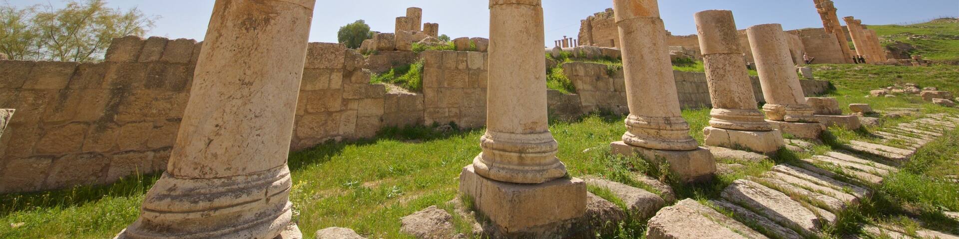 Jerash Archaeological Museum featuring a sunset, heritage architecture and a ruin