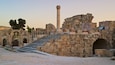 Jerash Archaeological Museum which includes building ruins, heritage architecture and a sunset