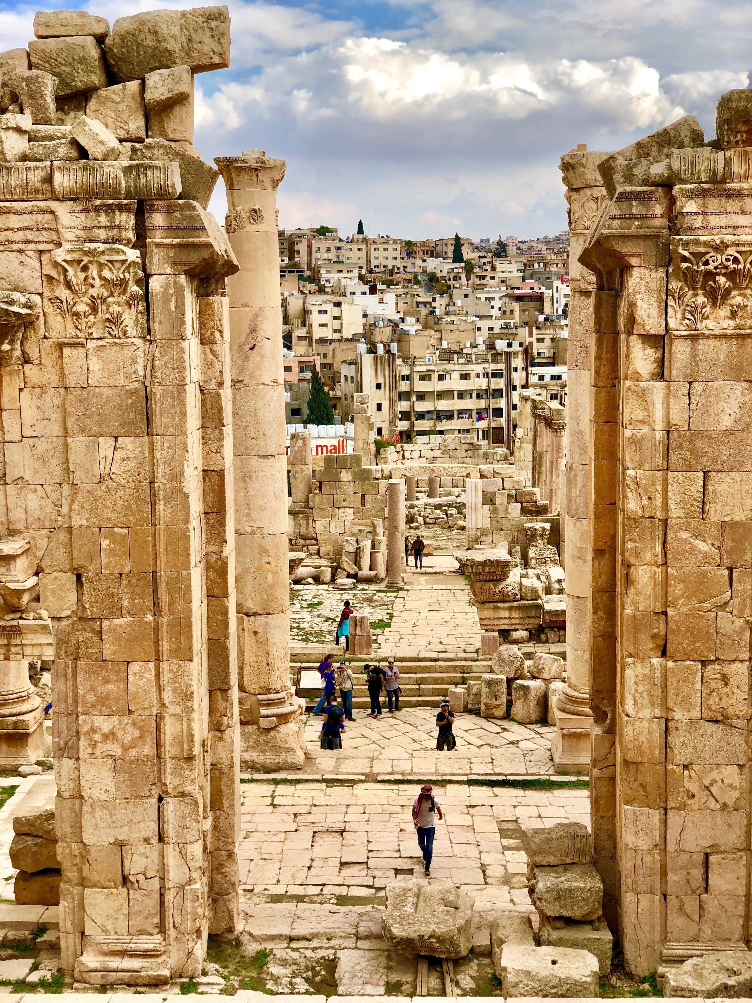 Ancient ruins with modern buildings behind :)