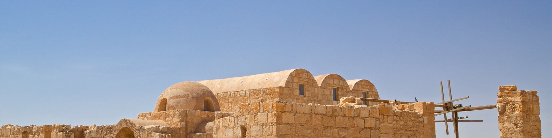 Quseir Amra which includes desert views and heritage elements as well as a couple