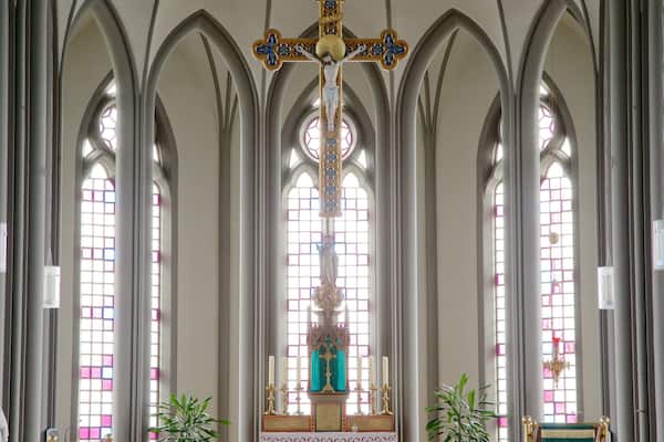 Landakotskirkja featuring religious elements, interior views and a church or cathedral