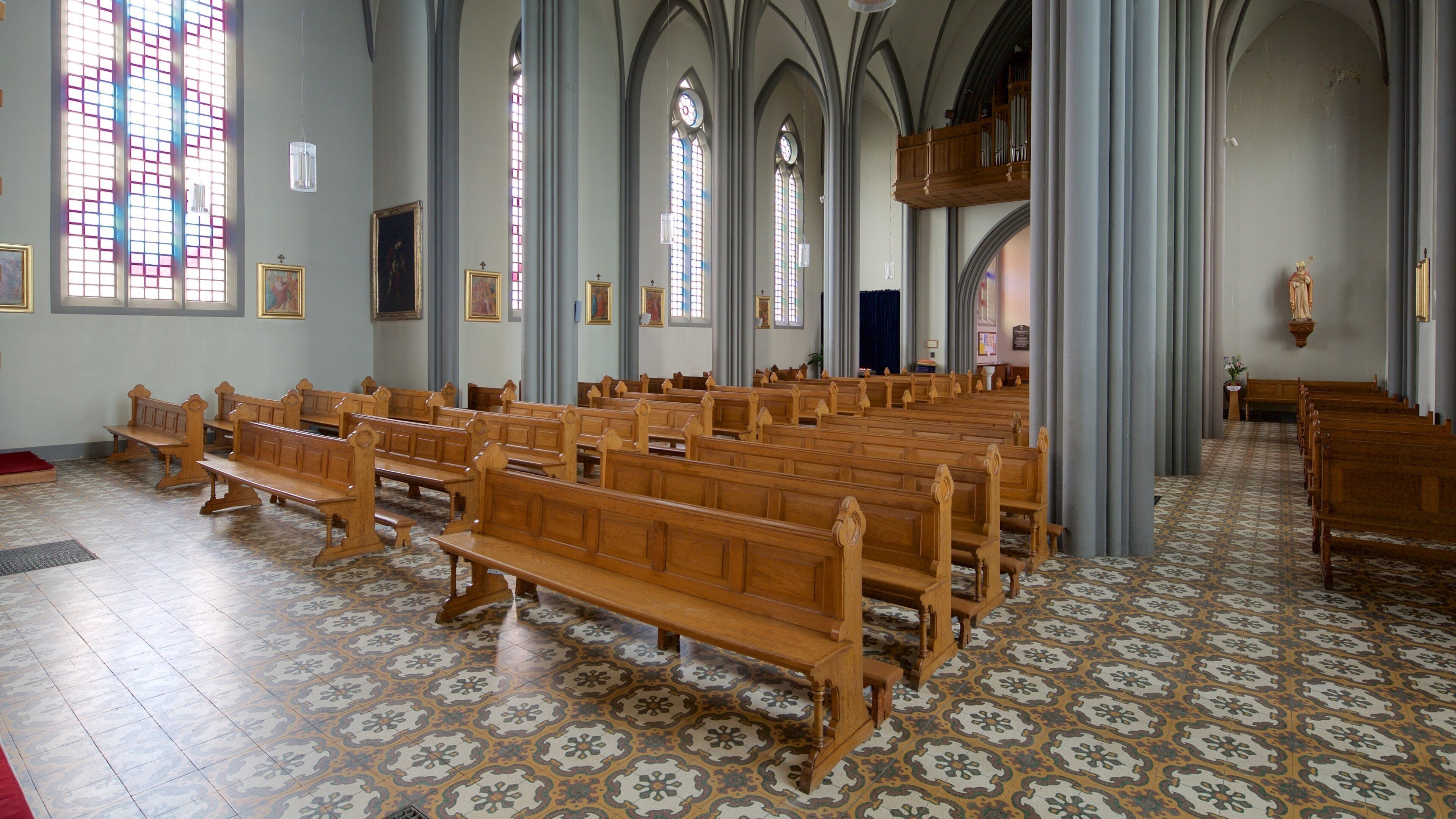 Landakotskirkja which includes interior views and a church or cathedral