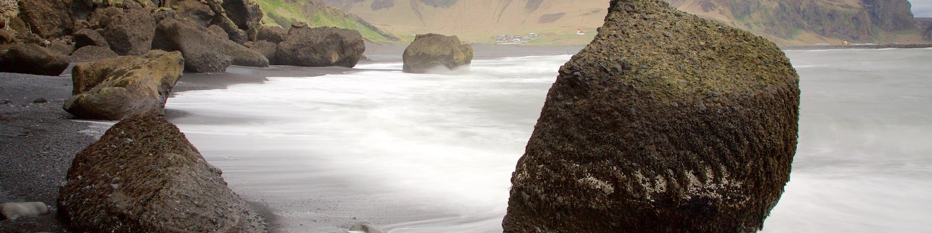 Black Beach featuring rugged coastline