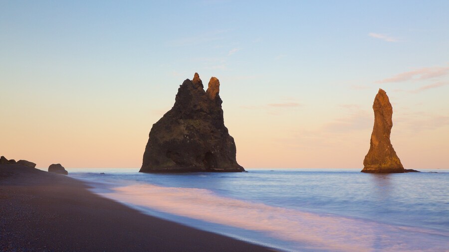 Reynisdrangar featuring a beach and a sunset