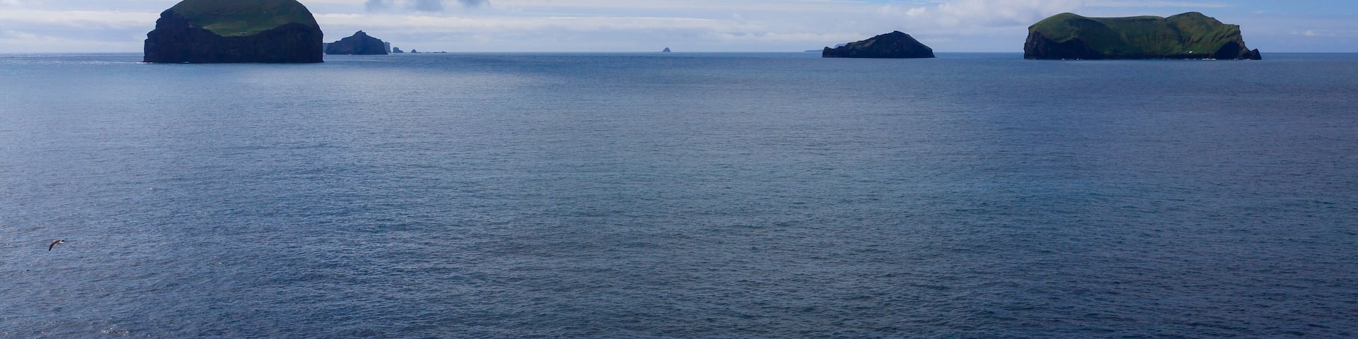 Vestmannaeyjar island beach day view, Iceland landscape.Surtsey island