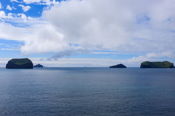 Vestmannaeyjar island beach day view, Iceland landscape.Surtsey island