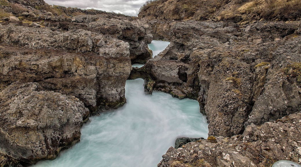 In the middle is children's bridge and waterfall. A few hundred years ago two children were walking across a natural bridge and fell. The mother paid men to break the bridge after so no other children would fall. The only part left is what you see here.