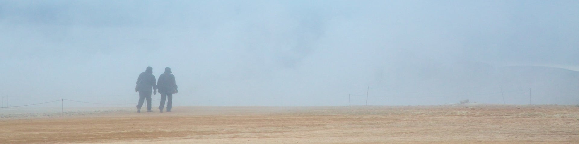 Namafjall featuring mist or fog as well as a couple