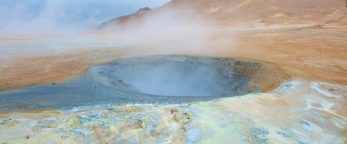 Namafjall which includes a hot spring and mist or fog
