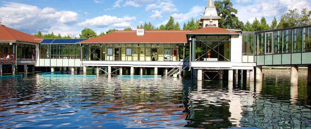 Lake Heviz showing a lake or waterhole and a luxury hotel or resort