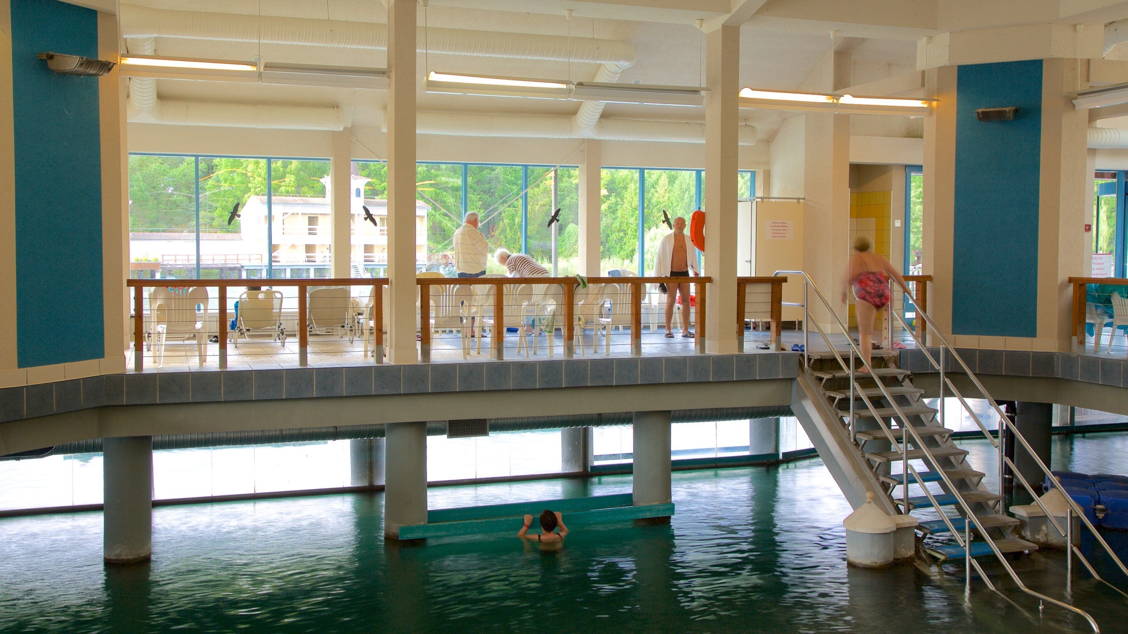 Lake Heviz featuring a lake or waterhole, interior views and a pool