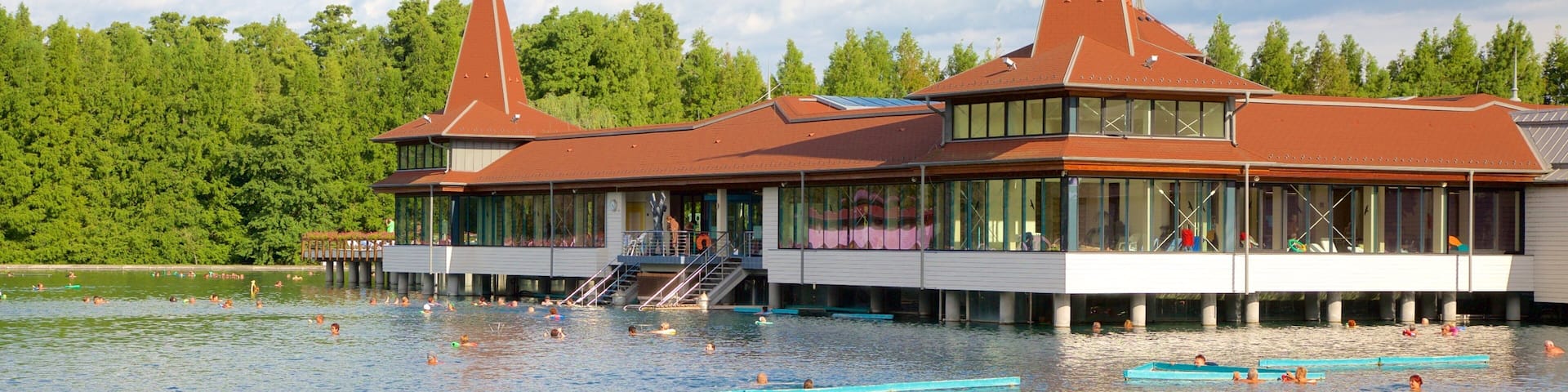 Lake Heviz featuring swimming, a luxury hotel or resort and a lake or waterhole