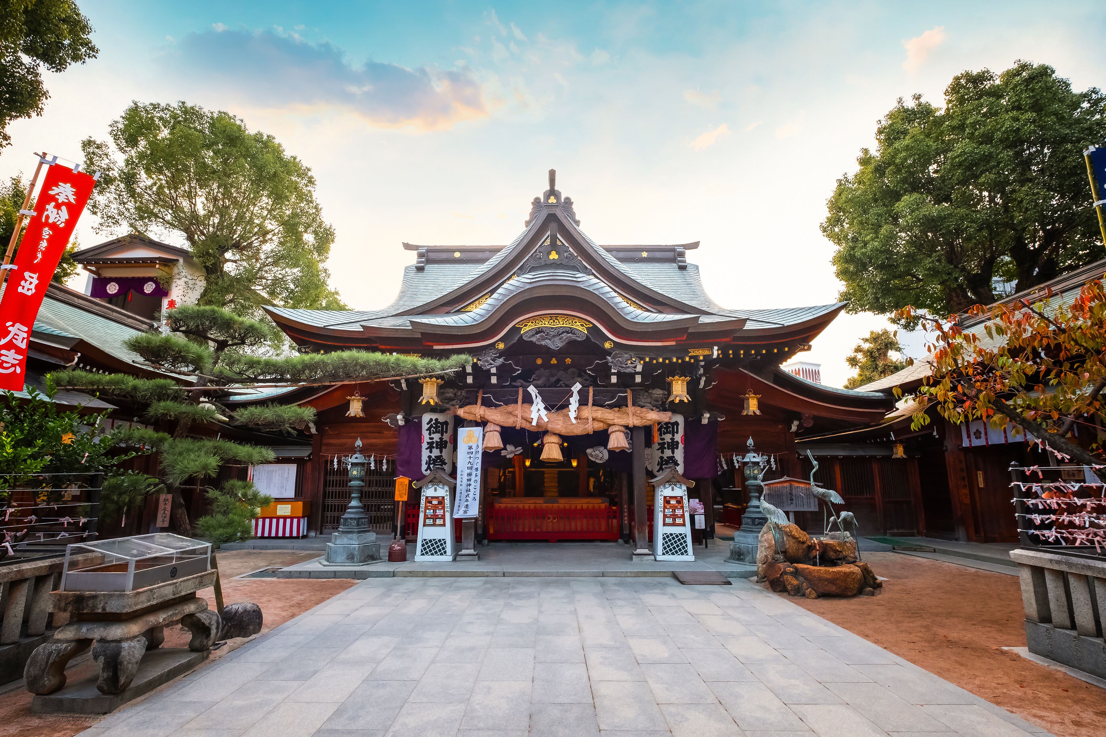 Fukuoka, Japan - Nov 20 2022: Kushida shrine in Hakata ward, founded in 757, the shrine dedicated to Amaterasu the goddess of the sun and Susanoo god of seas and storms, thunder and lightning