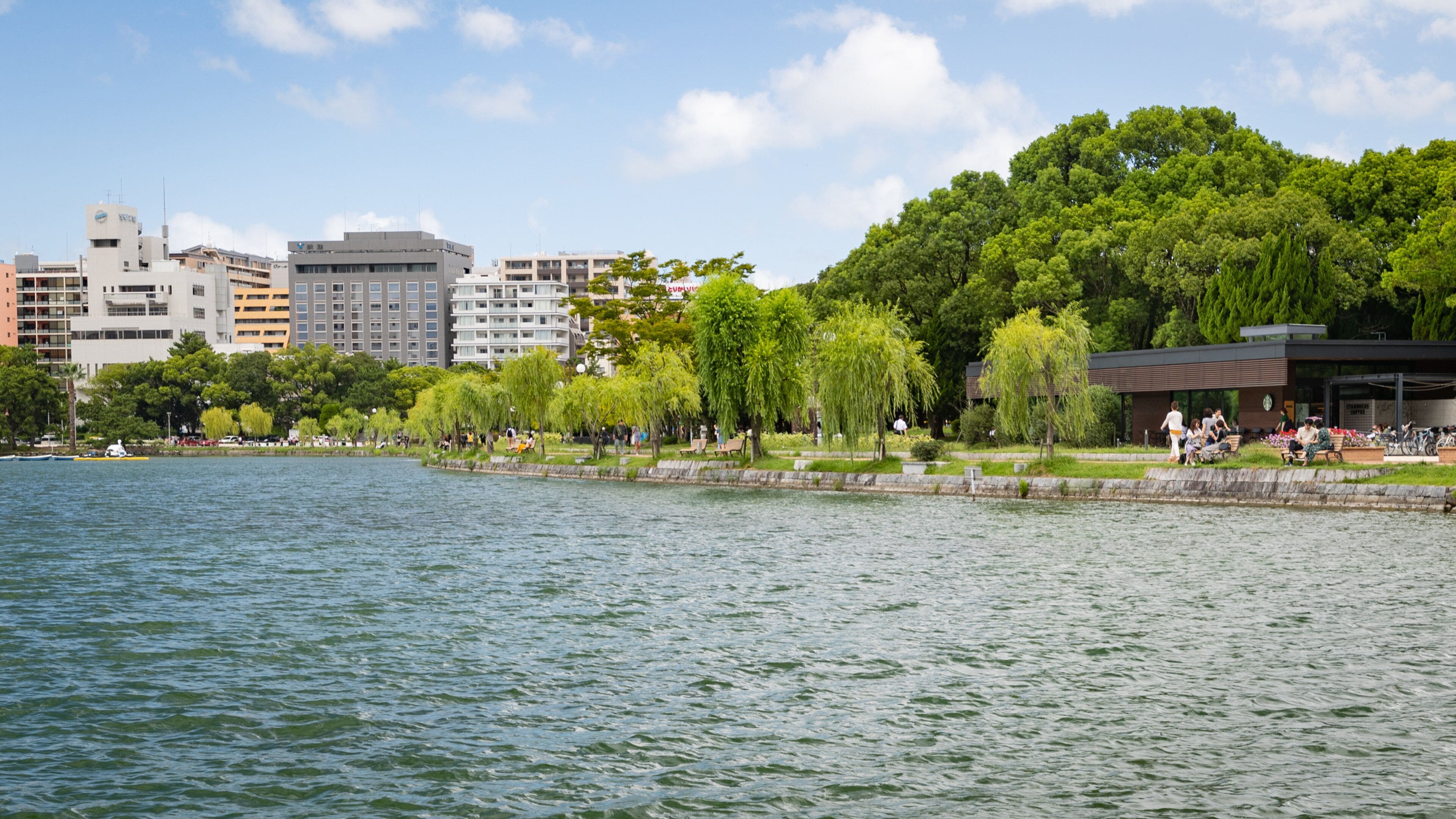 Ohori Park which includes a garden and a river or creek