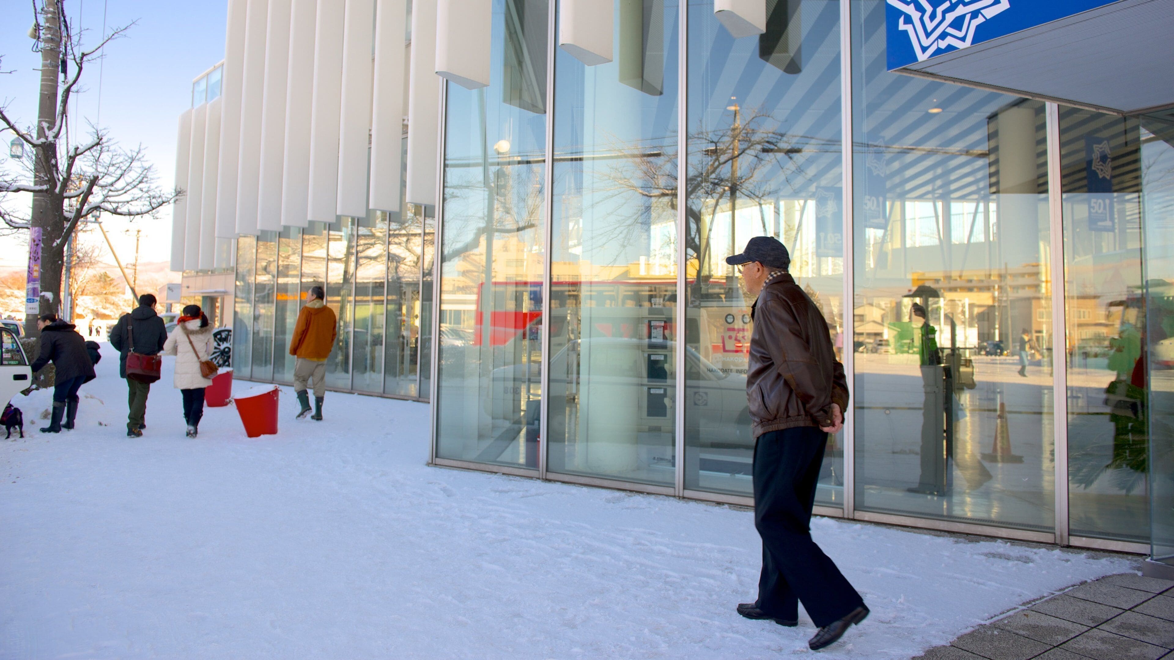 Goryokaku Tower which includes snow as well as an individual male