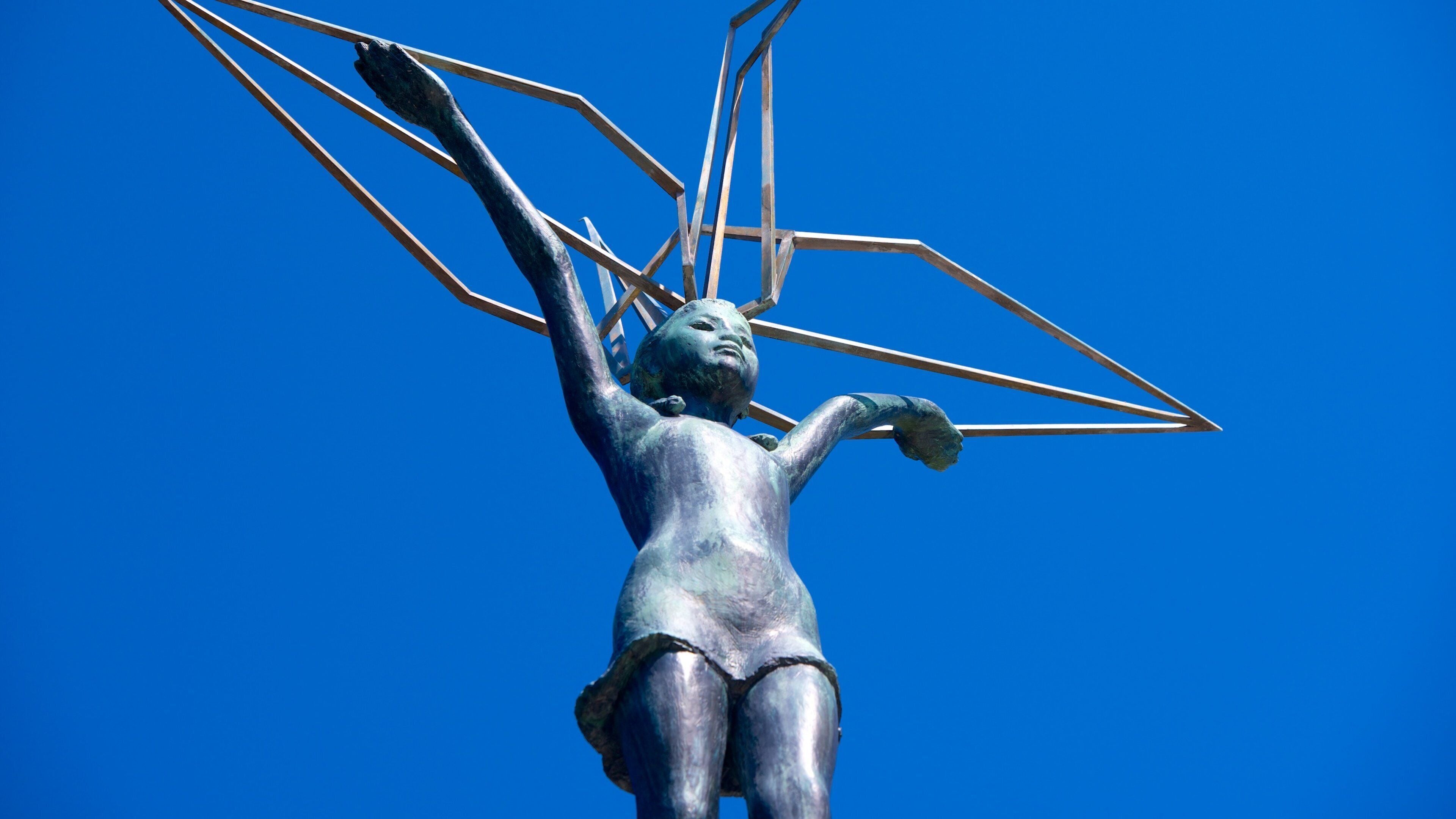 Monumento a la Paz de los Niños mostrando una estatua o escultura y un monumento