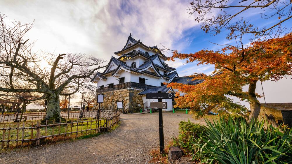 Beautiful sky during the autumn leaves season at Hikone Castle, Shiga Prefecture Japan.
