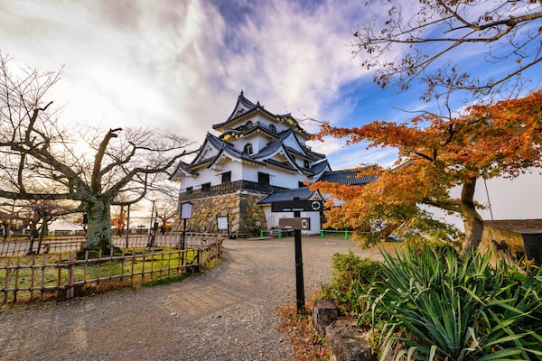 Beautiful sky during the autumn leaves season at Hikone Castle, Shiga Prefecture Japan.