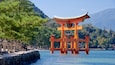 Itsukushima Shrine which includes heritage elements and a lake or waterhole
