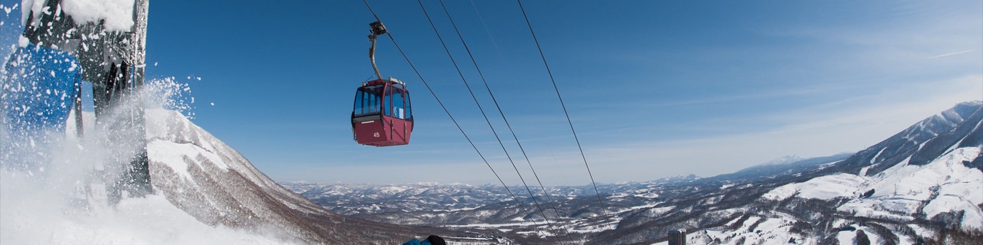 Rusutsu Resort featuring a gondola, snow skiing and snow