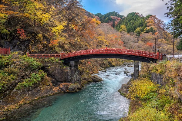 PK0898 Shinkyo Bridge (Sacred Bridge) crossing the Day River during Autumn Season. The one of the three most beautiful bridges in Japan, Nikko, Japan