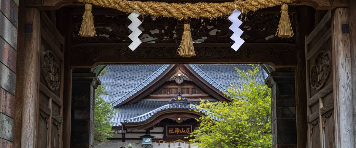 Oyama Shrine which includes heritage elements and street scenes as well as a small group of people