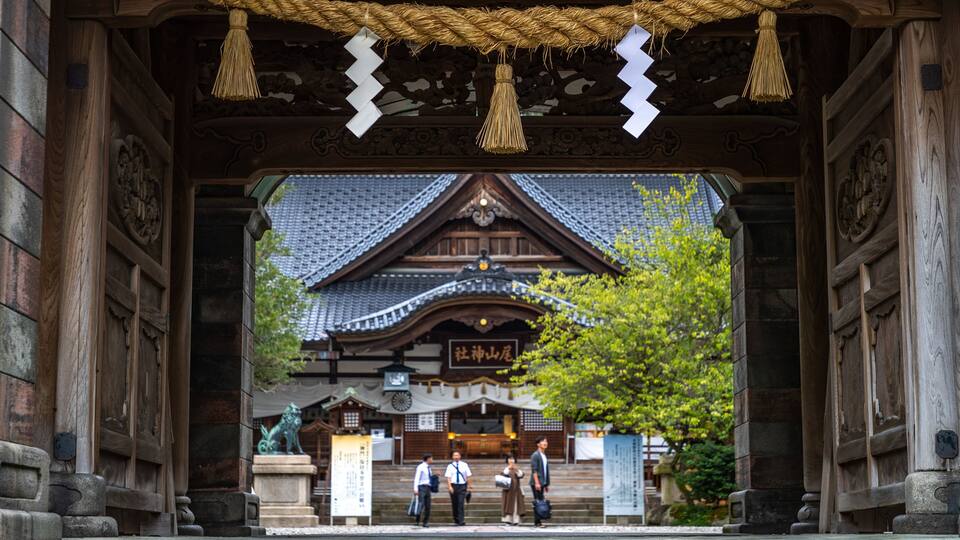 Oyama Shrine which includes heritage elements and street scenes as well as a small group of people