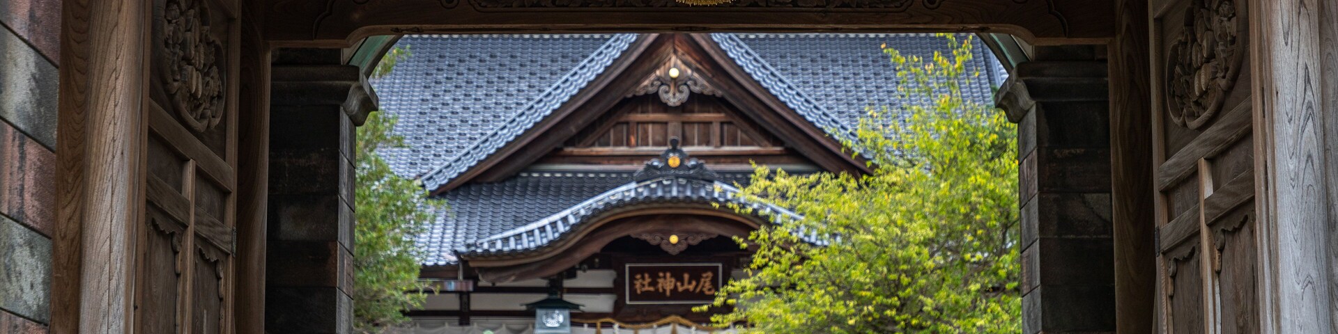 Oyama Shrine which includes heritage elements and street scenes as well as a small group of people