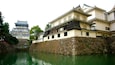 Kokura Castle which includes a river or creek, a lake or waterhole and château or palace