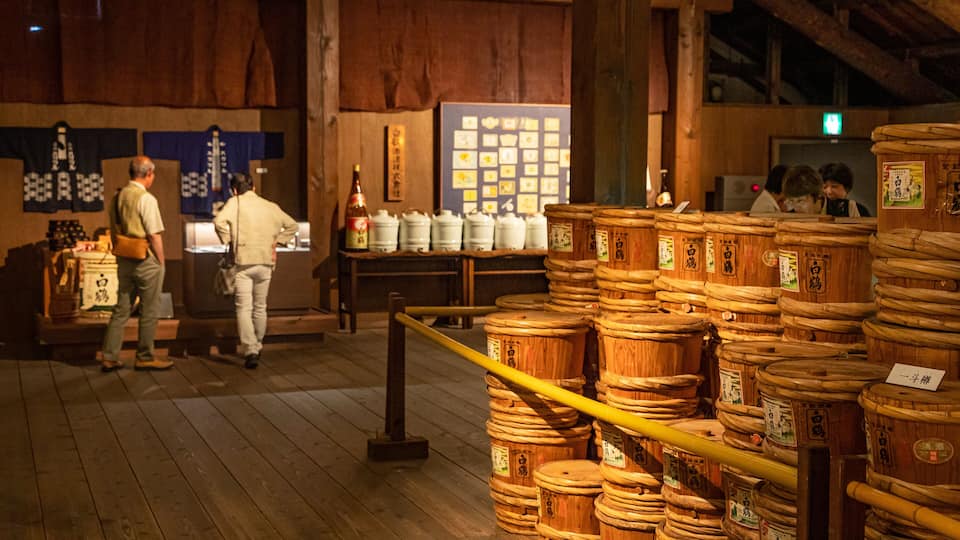 Hakutsuru Sake Brewery Museum featuring interior views as well as a couple