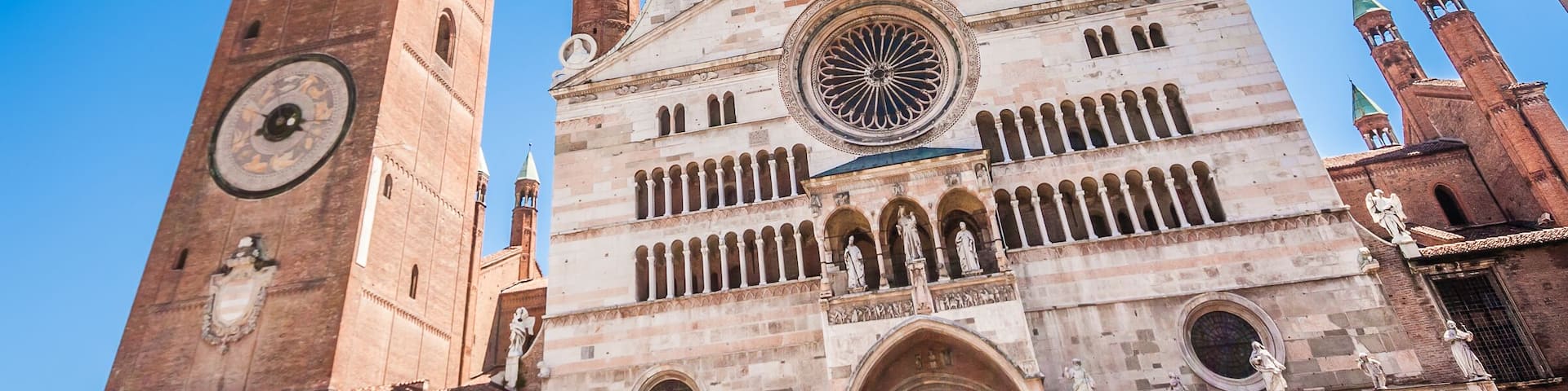 Ancient Cathedral of Cremona with famous Torrazzo bell tower and baptistery in Cremona, Lombardy, Italy