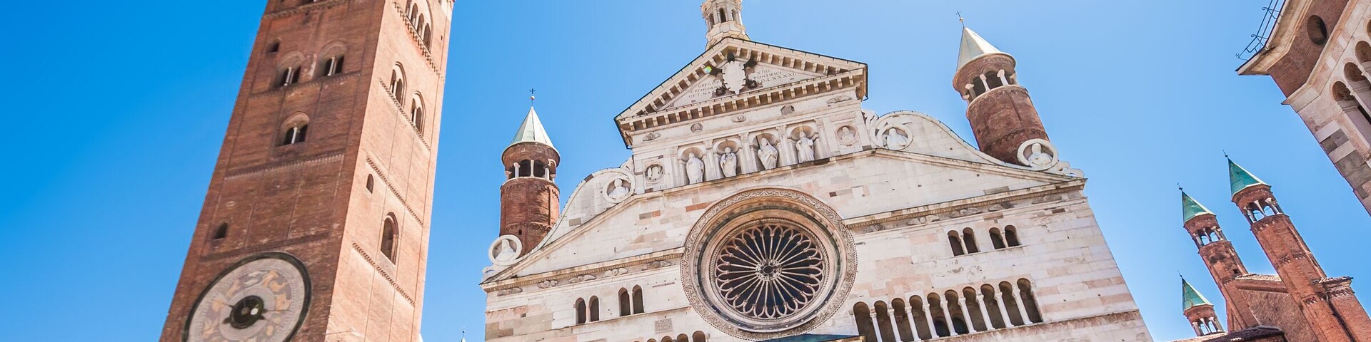 Ancient Cathedral of Cremona with famous Torrazzo bell tower and baptistery in Cremona, Lombardy, Italy