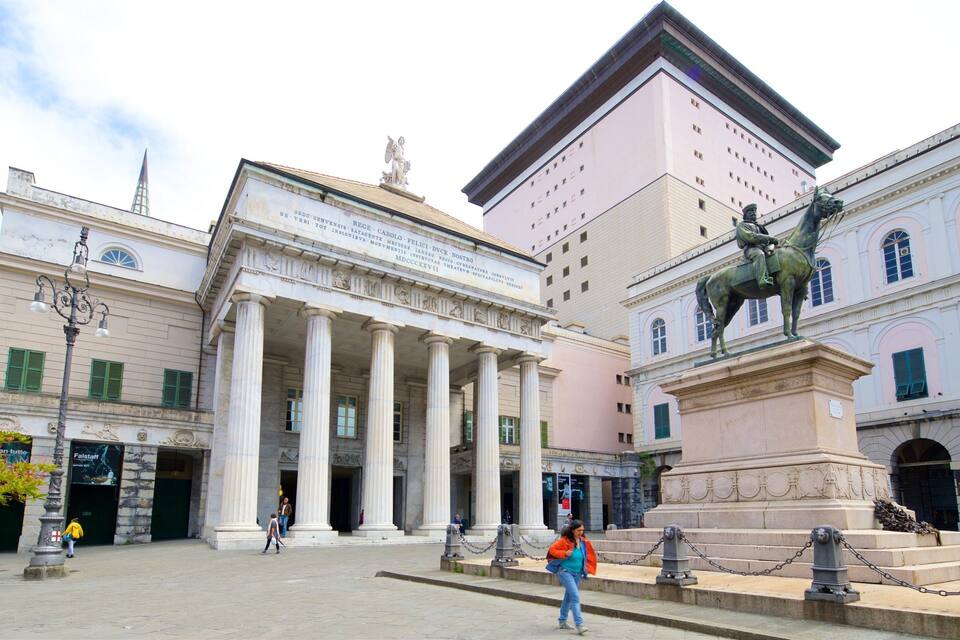 A historic building with classical architecture, including columns and a statue of a man on horseback.
