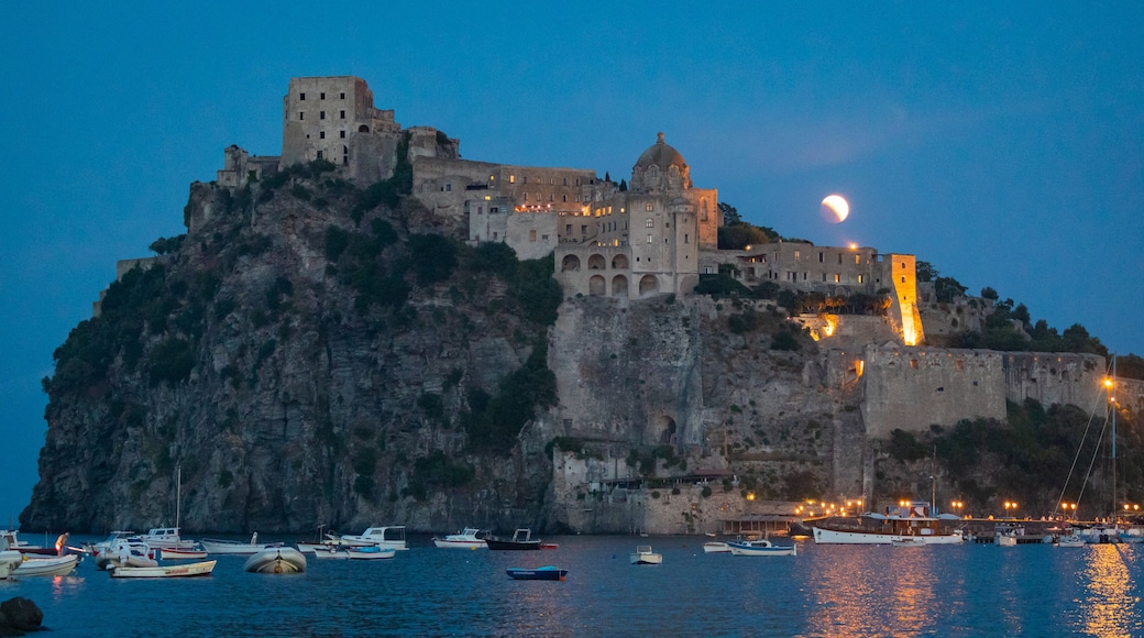 Aragonese Castle which includes general coastal views, night scenes and heritage elements