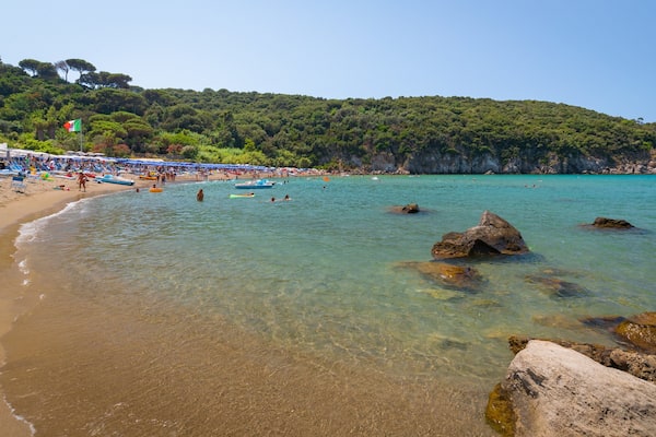 Bay of San Montano which includes a sandy beach and general coastal views