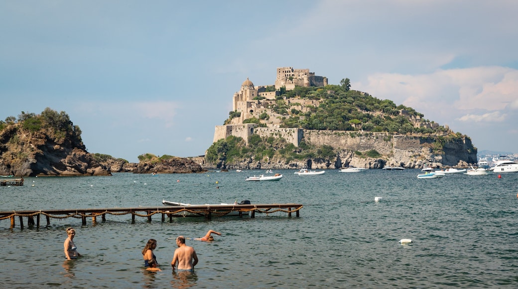 Cartaromana Beach featuring swimming, island views and a bay or harbor