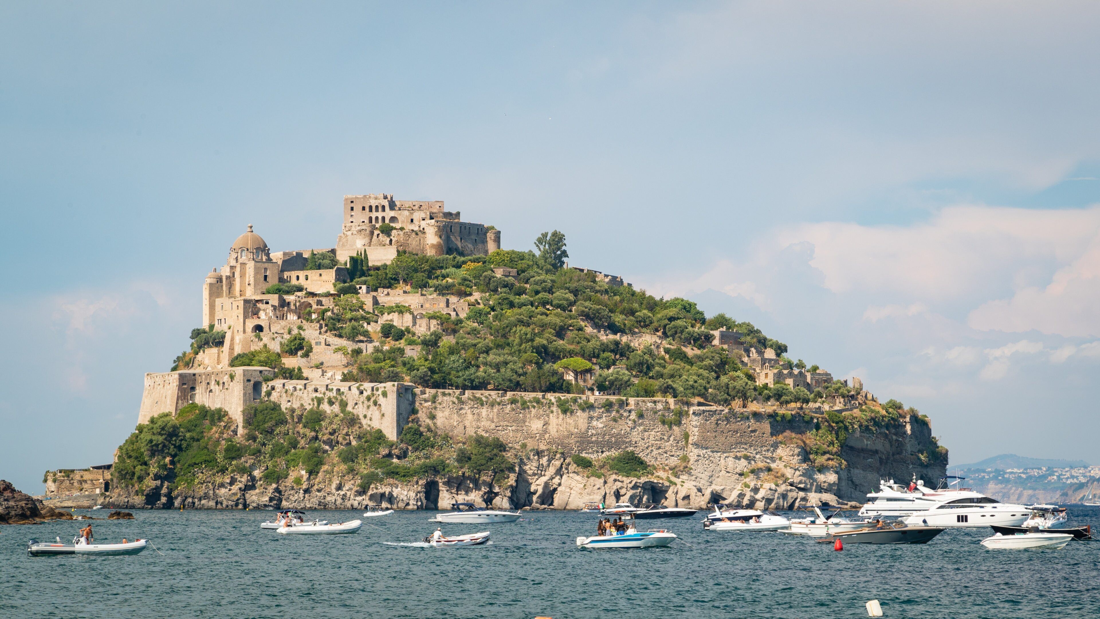 Cartaromana Beach which includes island images, general coastal views and heritage elements