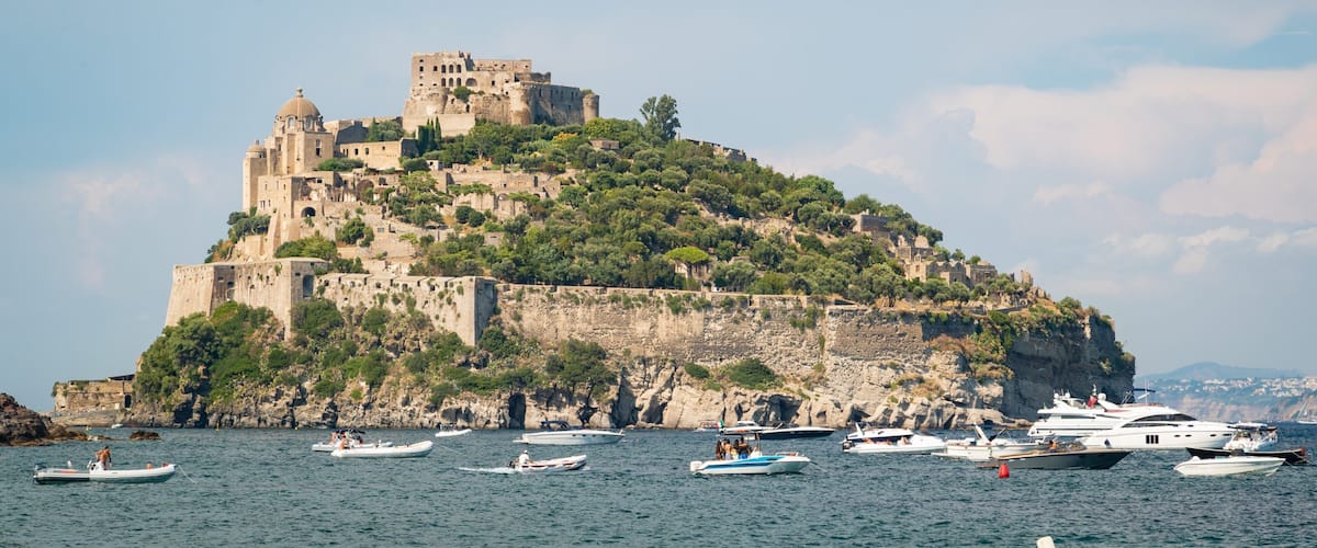 Cartaromana Beach which includes island images, general coastal views and heritage elements
