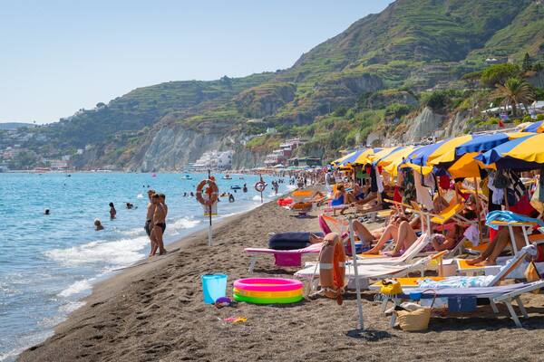 Maronti Beach which includes a beach, general coastal views and swimming