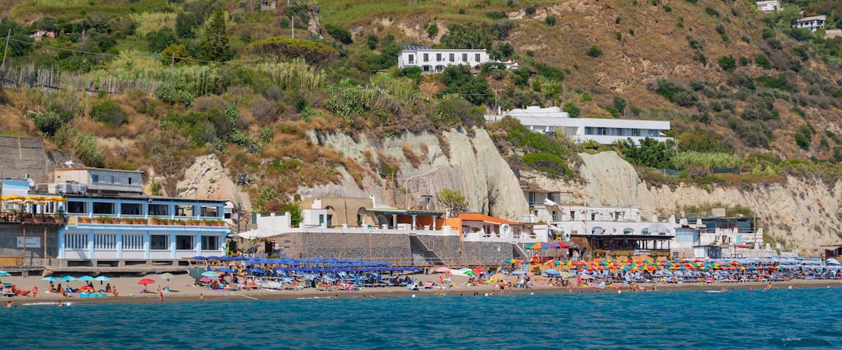 Maronti Beach showing general coastal views, a coastal town and a sandy beach