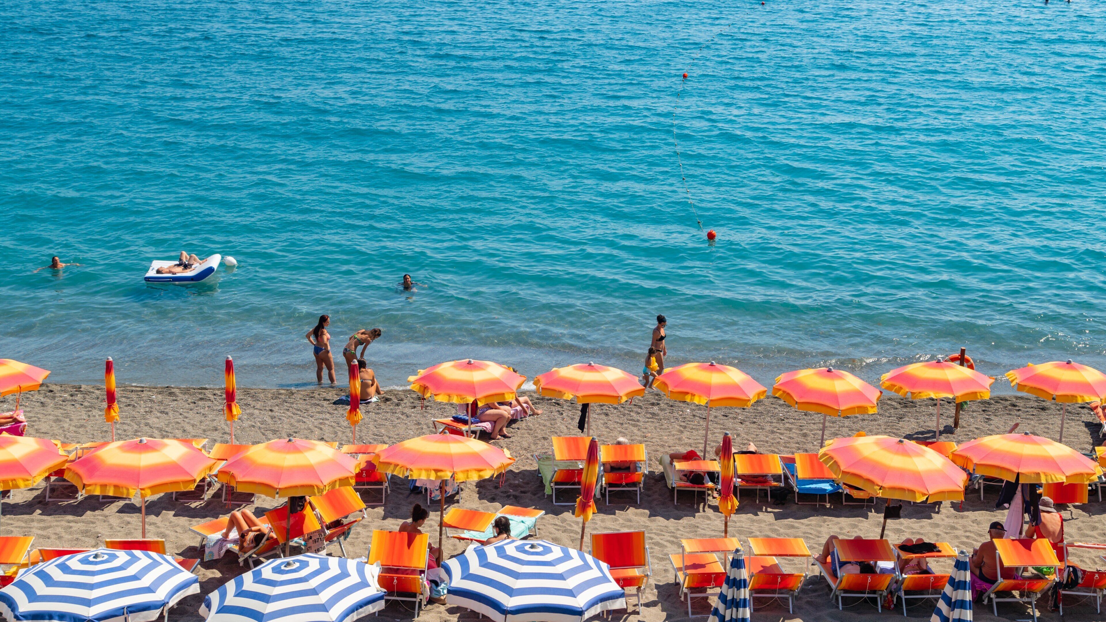 Maronti Beach which includes a sandy beach, swimming and general coastal views