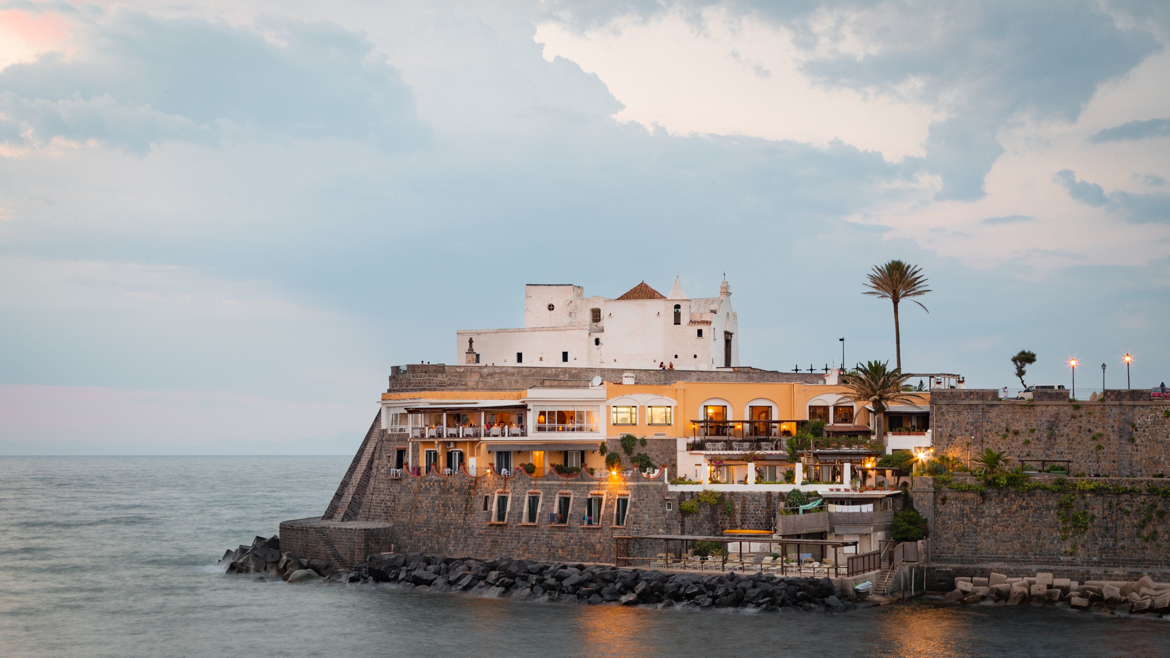 Soccorso Church which includes general coastal views, landscape views and a coastal town