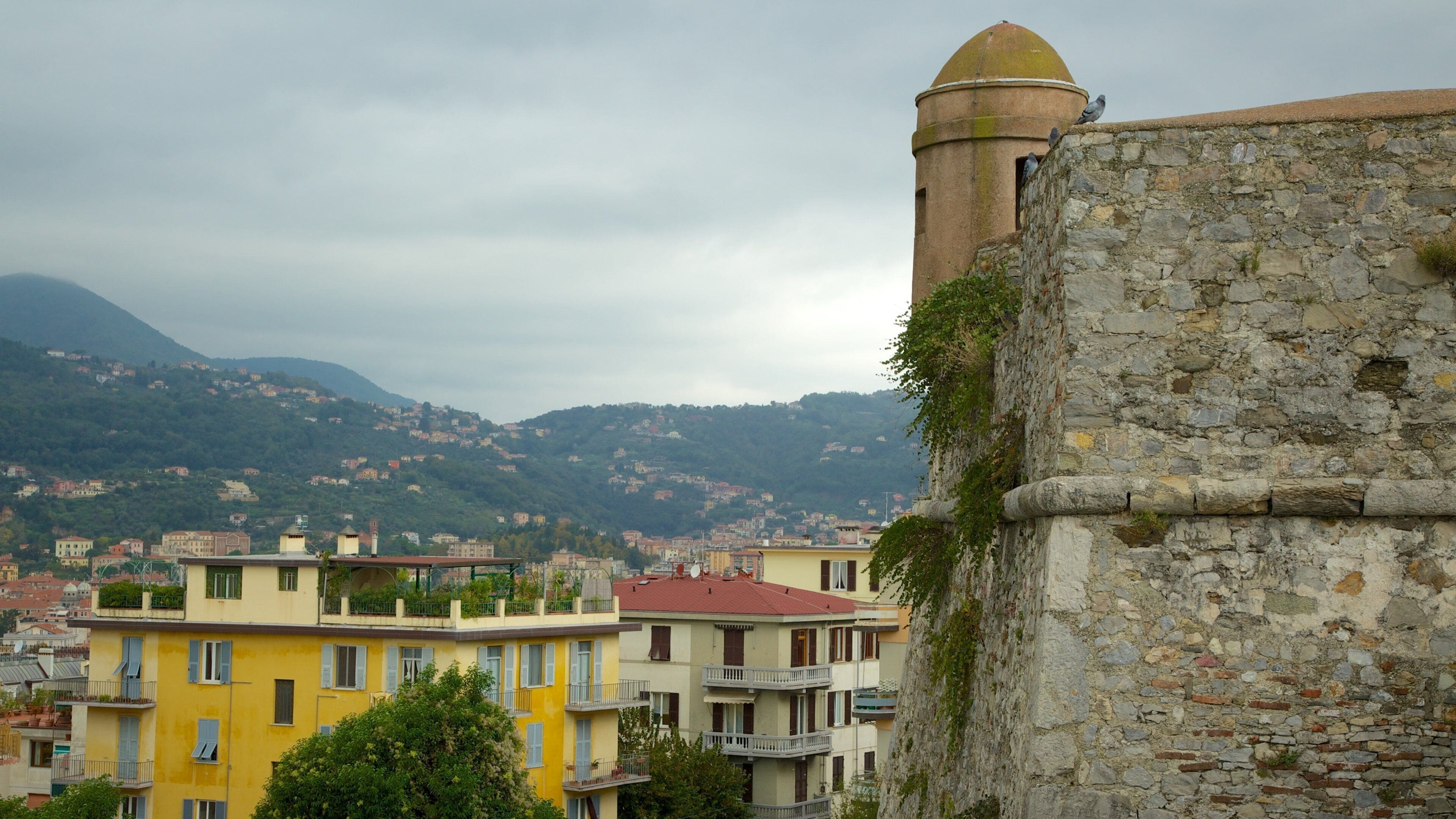 Castello San Giorgio featuring a city