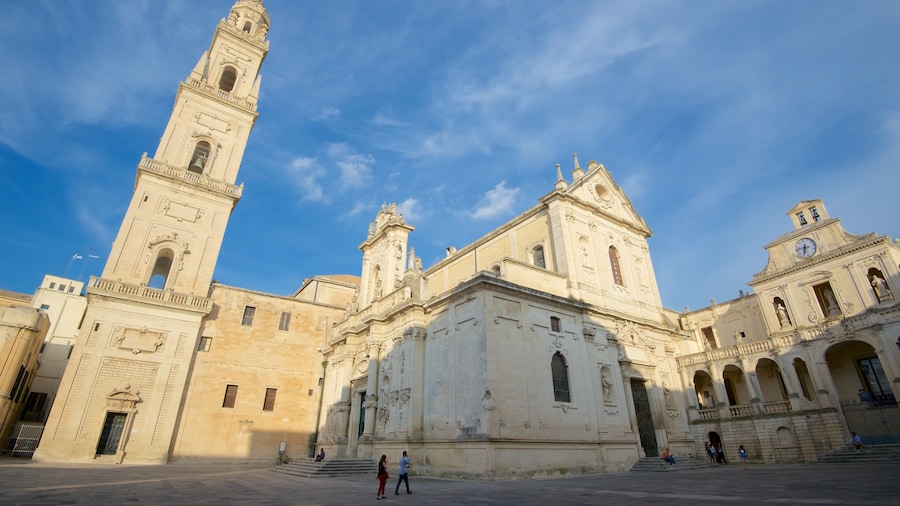 Piazza del Duomo which includes a square or plaza, a church or cathedral and heritage architecture