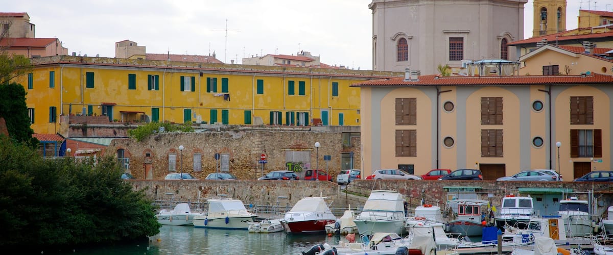 Chiesa di Santa Caterina featuring a marina, a coastal town and heritage architecture