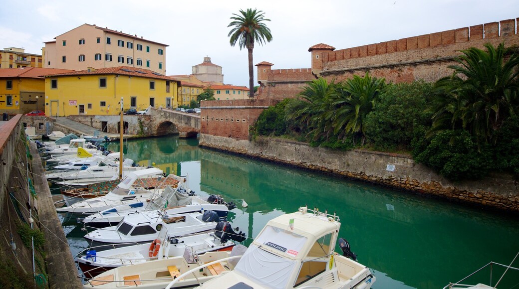 Fortezza Nuova which includes a marina, a river or creek and heritage architecture