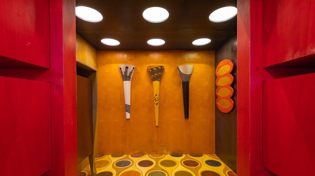 Museo Bottega della Tarsia Lignea which includes art and interior views