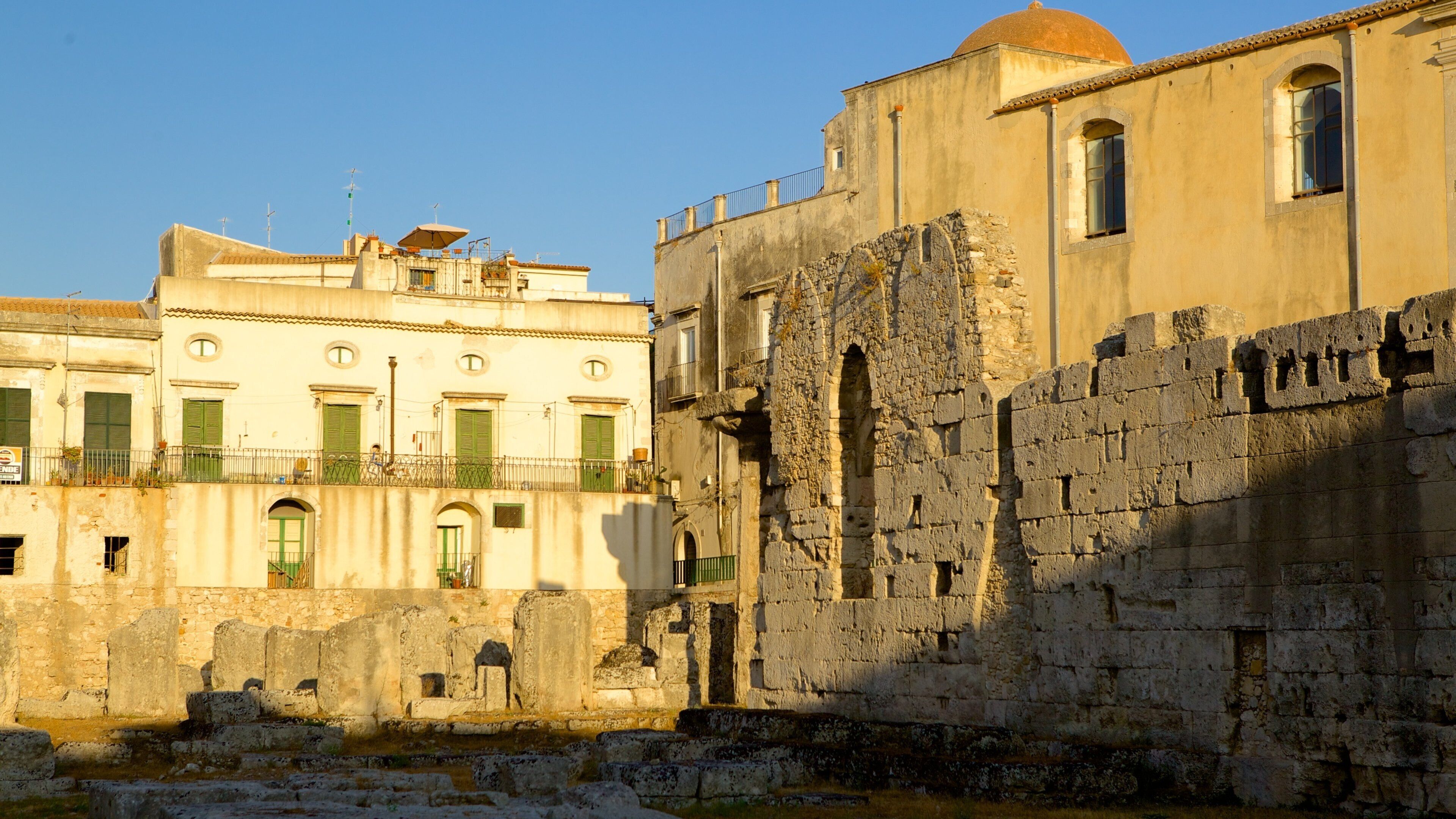 Temple of Apollo which includes heritage elements and building ruins