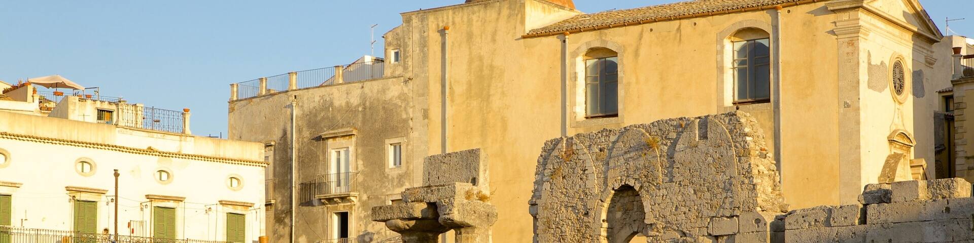 Temple of Apollo featuring a ruin and heritage elements